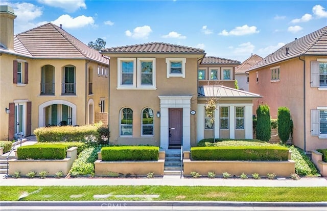 97 Twin Gables, Irvine, CA 92620 - view of front of home with stucco siding and a tile roof
