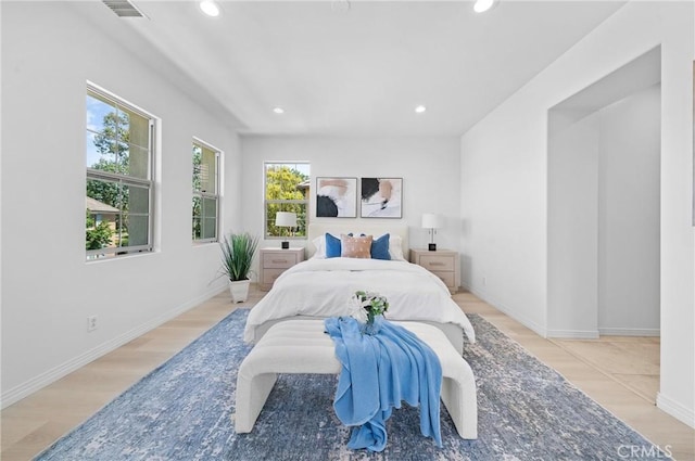 97 Twin Gables, Irvine, CA 92620 - bedroom featuring recessed lighting, baseboards, and wood finished floors