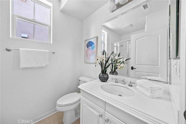 97 Twin Gables, Irvine, CA 92620 - full bath featuring vanity, toilet, plenty of natural light, and an enclosed shower