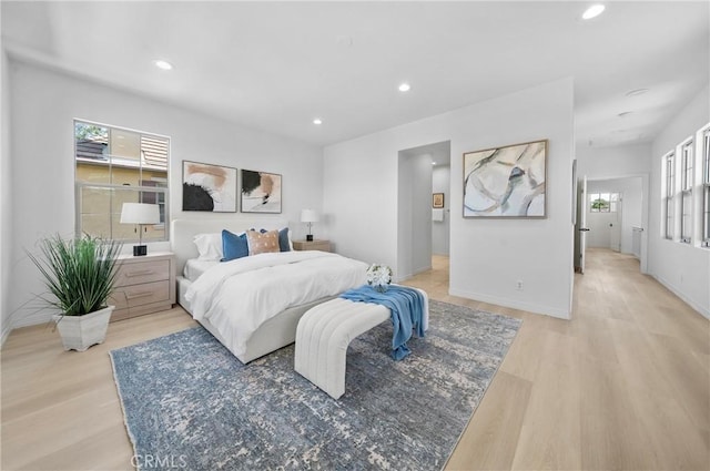 97 Twin Gables, Irvine, CA 92620 - bedroom with light wood-type flooring, recessed lighting, and baseboards