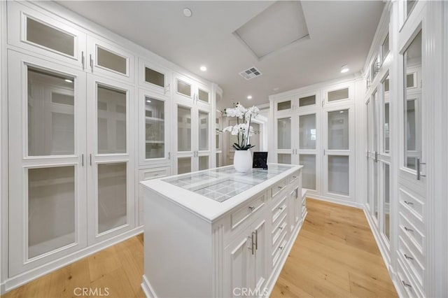 608 Arbolada Dr, Arcadia, CA 91006 - spacious closet featuring light wood-style flooring and attic access