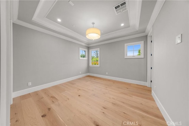 608 Arbolada Dr, Arcadia, CA 91006 - empty room with a raised ceiling, crown molding, light wood-style flooring, recessed lighting, and baseboards