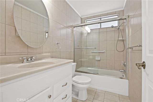 28161 Via Chabas, Mission Viejo, CA 92692 - full bathroom featuring toilet, vanity, enclosed tub / shower combo, tile walls, and tile patterned flooring