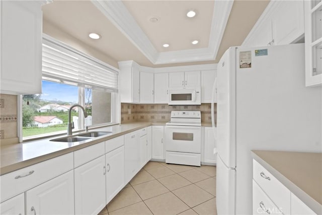 28161 Via Chabas, Mission Viejo, CA 92692 - kitchen with white appliances, a sink, backsplash, white cabinetry, and recessed lighting