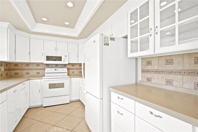 28161 Via Chabas, Mission Viejo, CA 92692 - kitchen featuring white appliances, backsplash, white cabinetry, light tile patterned floors, and recessed lighting