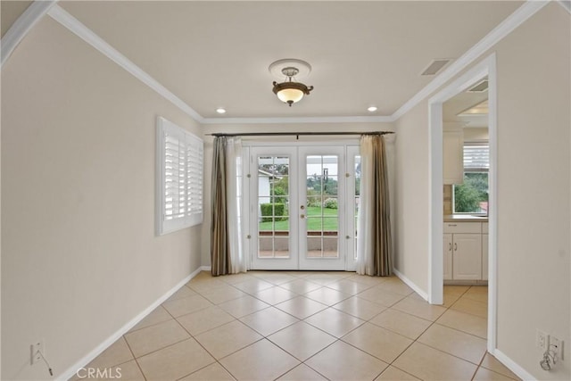 28161 Via Chabas, Mission Viejo, CA 92692 - entryway with french doors, crown molding, baseboards, light tile patterned floors, and recessed lighting