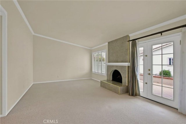 28161 Via Chabas, Mission Viejo, CA 92692 - unfurnished living room with french doors, carpet flooring, baseboards, a fireplace, and ornamental molding