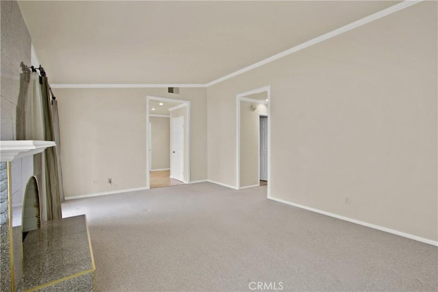 28161 Via Chabas, Mission Viejo, CA 92692 - unfurnished living room featuring baseboards, a fireplace with raised hearth, carpet, and crown molding