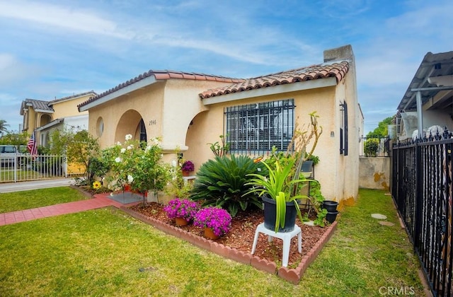 2946 Missouri Ave, South Gate, CA 90280 - mediterranean / spanish home with stucco siding and a tile roof