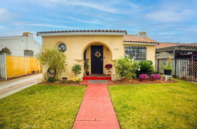 2946 Missouri Ave, South Gate, CA 90280 - mediterranean / spanish-style house featuring stucco siding and a tiled roof