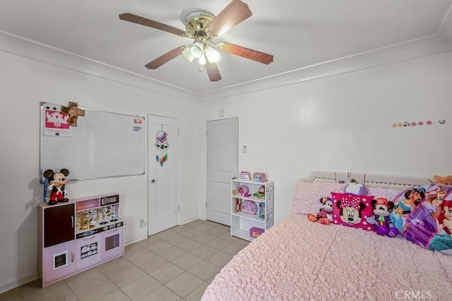 2946 Missouri Ave, South Gate, CA 90280 - bedroom featuring light tile patterned flooring, ceiling fan, and ornamental molding