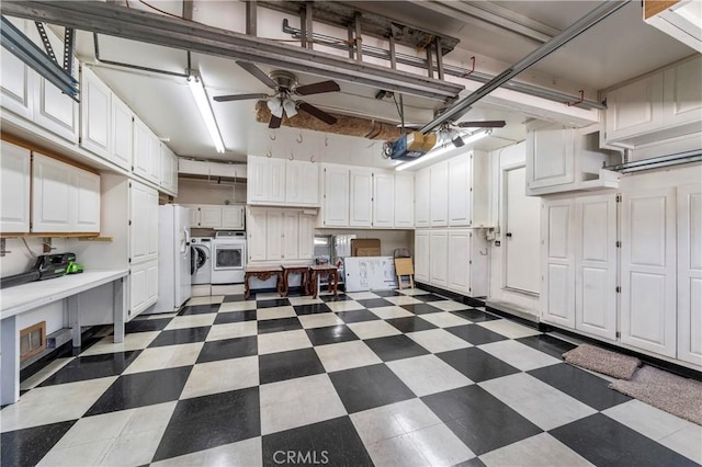 23801 Birch Ln, Mission Viejo, CA 92691 - garage featuring washing machine and clothes dryer, ceiling fan, a garage door opener, and white refrigerator with ice dispenser