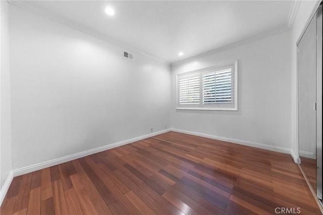 2712 N Roxbury St, Orange, CA 92867 - spare room with dark wood finished floors, ornamental molding, baseboards, and recessed lighting