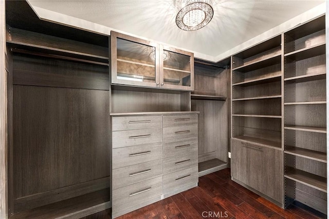2712 N Roxbury St, Orange, CA 92867 - spacious closet featuring a chandelier and dark wood-type flooring