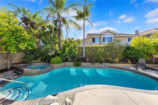 2712 N Roxbury St, Orange, CA 92867 - view of swimming pool featuring a fenced backyard and a pool with connected hot tub
