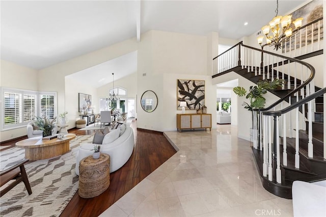 2712 N Roxbury St, Orange, CA 92867 - living area featuring a chandelier, high vaulted ceiling, stairs, baseboards, and recessed lighting