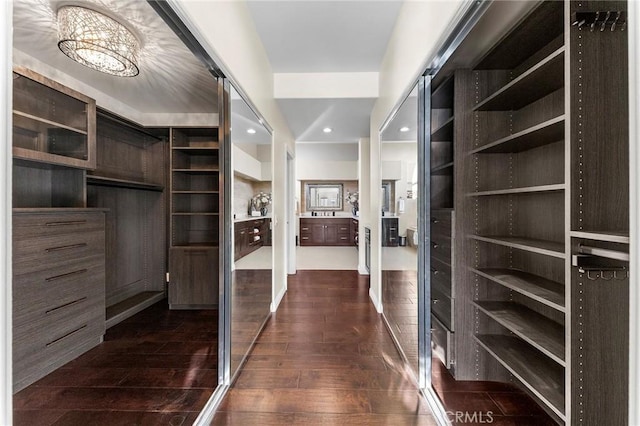 2712 N Roxbury St, Orange, CA 92867 - walk in closet with dark wood-type flooring