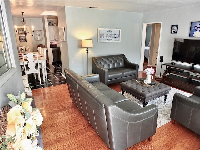 251 W Markland Dr, Monterey Park, CA 91754 - living area featuring a chandelier and wood finished floors