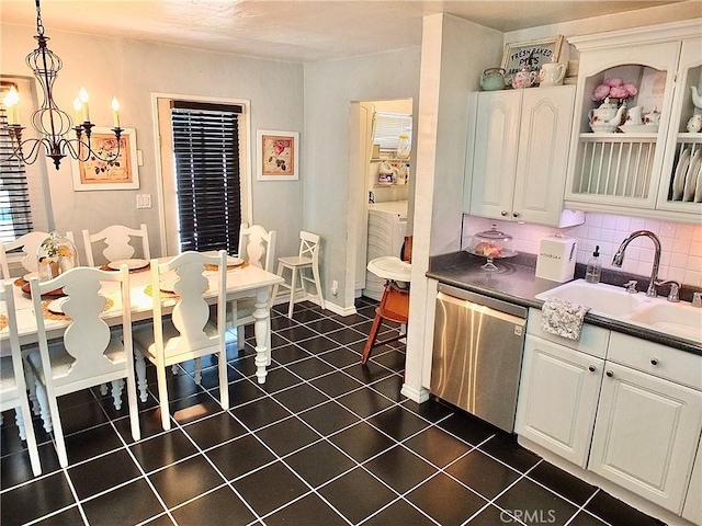 251 W Markland Dr, Monterey Park, CA 91754 - kitchen with dishwasher, a sink, white cabinetry, decorative backsplash, and dark tile patterned flooring
