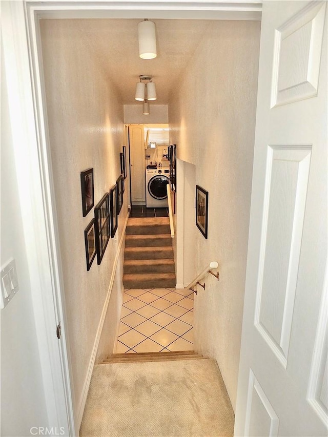 251 W Markland Dr, Monterey Park, CA 91754 - hallway featuring washer / dryer, light carpet, a textured wall, and stairs