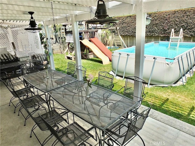 251 W Markland Dr, Monterey Park, CA 91754 - view of patio / terrace featuring outdoor dining area, a pergola, an outdoor pool, and a playground