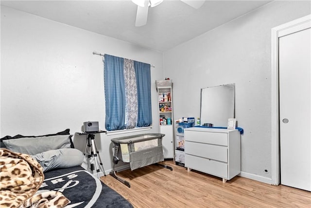 4776 E Lowe Ave, Fresno, CA 93702 - bedroom with light wood-style flooring, ceiling fan, and baseboards