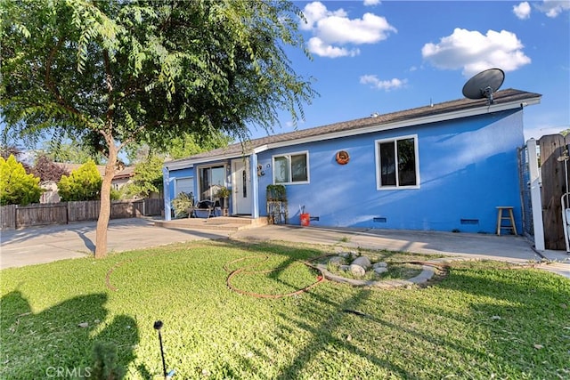 4776 E Lowe Ave, Fresno, CA 93702 - back of property with crawl space, a patio area, and driveway