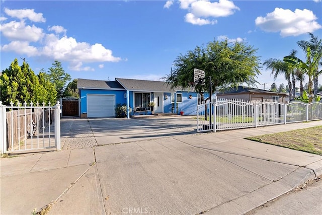 4776 E Lowe Ave, Fresno, CA 93702 - ranch-style home featuring a gate, driveway, and an attached garage