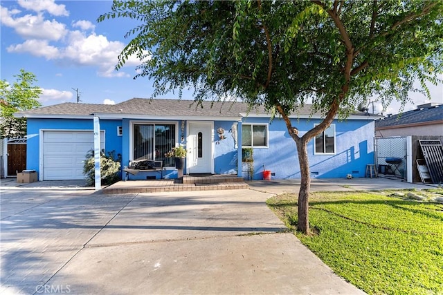 4776 E Lowe Ave, Fresno, CA 93702 - single story home featuring a garage, driveway, and stucco siding