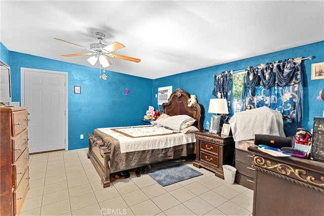 4776 E Lowe Ave, Fresno, CA 93702 - bedroom with light tile patterned floors and a ceiling fan