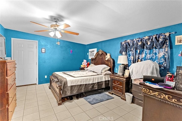 4776 E Lowe Ave, Fresno, CA 93702 - bedroom with a ceiling fan and light tile patterned floors