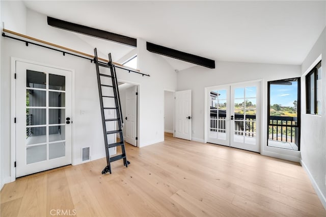1450 Terrace Way, Laguna Beach, CA 92651 - unfurnished room featuring french doors, a barn door, and wood finished floors