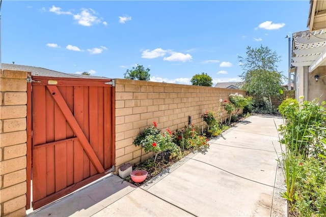 243 Firestone, Hemet, CA 92545 - fenced backyard with a gate and a patio