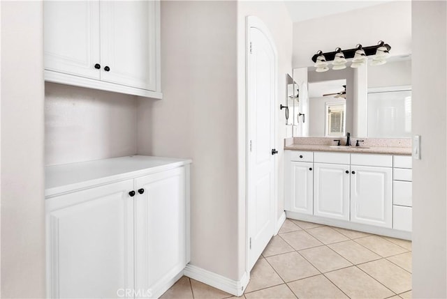 243 Firestone, Hemet, CA 92545 - bathroom featuring vanity, tile patterned flooring, a ceiling fan, and baseboards