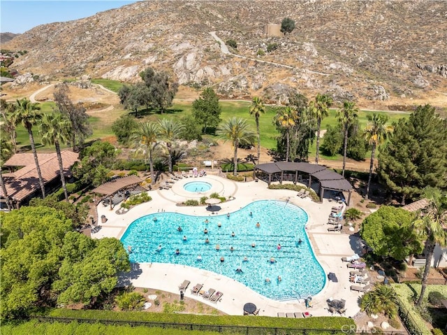 243 Firestone, Hemet, CA 92545 - community pool featuring a mountain view and a patio area