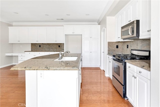 243 Firestone, Hemet, CA 92545 - kitchen with appliances with stainless steel finishes, a sink, light wood-style floors, white cabinets, and crown molding