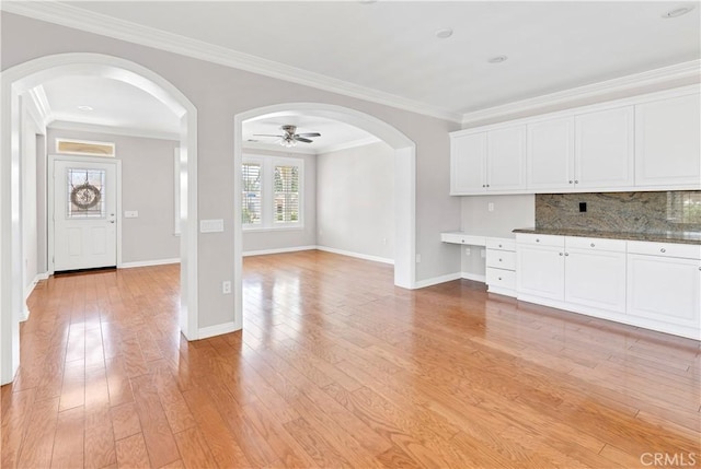 243 Firestone, Hemet, CA 92545 - kitchen featuring crown molding, ceiling fan, decorative backsplash, light wood-type flooring, and white cabinets