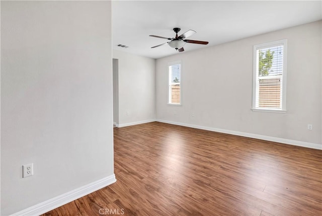 243 Firestone, Hemet, CA 92545 - spare room with wood finished floors, baseboards, and ceiling fan