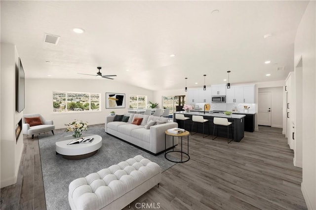 9641 Buena Vista St, Apple Valley, CA 92308 - living area featuring wood finished floors, ceiling fan, recessed lighting, and vaulted ceiling