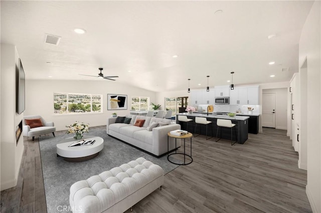 9641 Buena Vista St, Apple Valley, CA 92308 - living area featuring wood finished floors, ceiling fan, recessed lighting, and vaulted ceiling