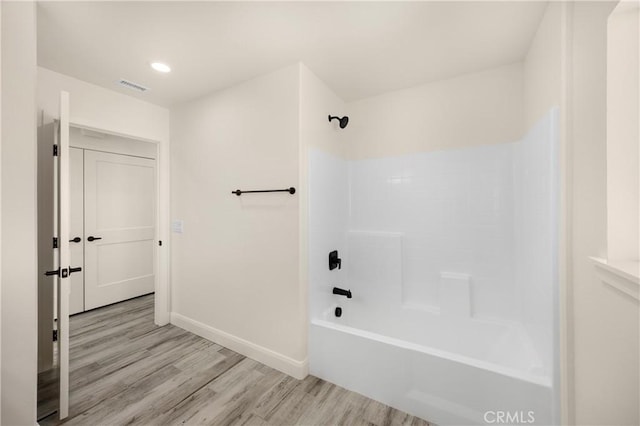 9641 Buena Vista St, Apple Valley, CA 92308 - full bath with wood finished floors, washtub / shower combination, and recessed lighting