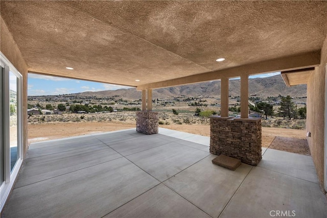 9641 Buena Vista St, Apple Valley, CA 92308 - view of patio / terrace with a mountain view
