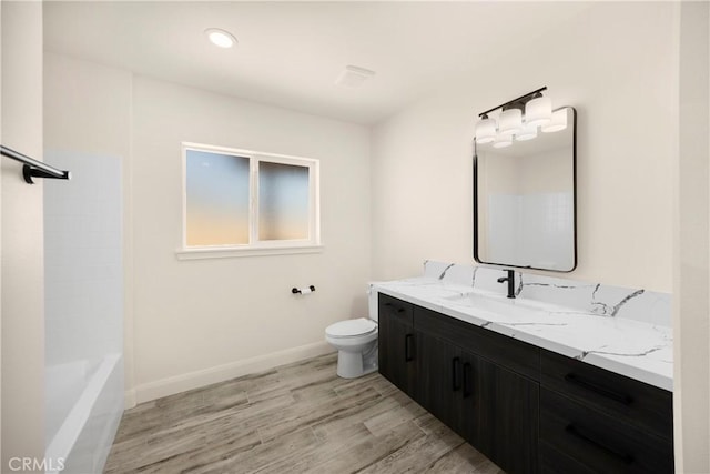 9641 Buena Vista St, Apple Valley, CA 92308 - full bath featuring vanity, wood finished floors, toilet, and baseboards