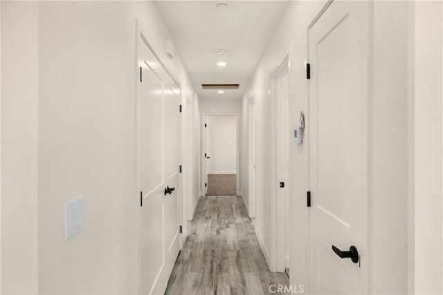 9641 Buena Vista St, Apple Valley, CA 92308 - corridor featuring light wood-type flooring