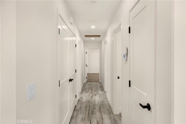 9641 Buena Vista St, Apple Valley, CA 92308 - hall with light wood-style floors and baseboards