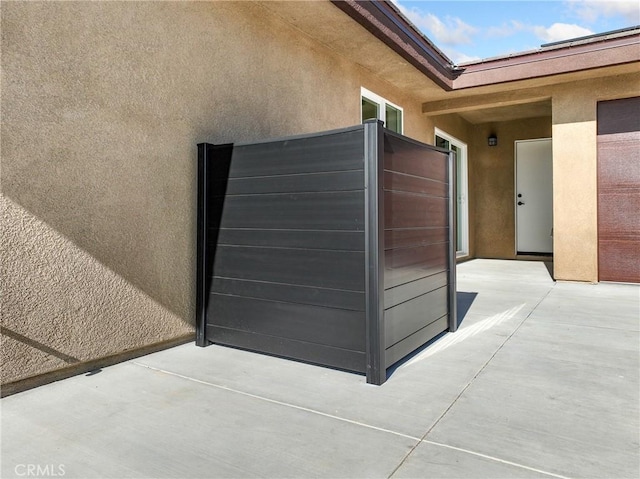 9641 Buena Vista St, Apple Valley, CA 92308 - exterior space featuring stucco siding and a patio area