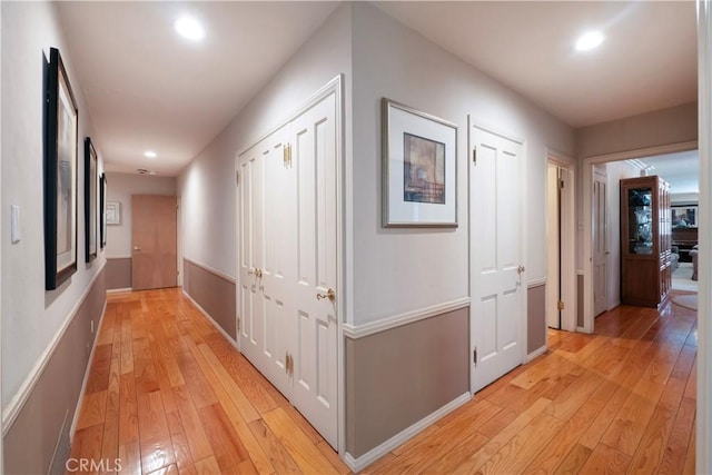 3152 Parkside Dr, San Bernardino, CA 92404 - hall featuring light wood-style flooring, recessed lighting, and baseboards