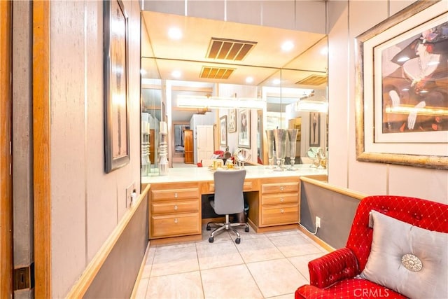3152 Parkside Dr, San Bernardino, CA 92404 - office area featuring built in study area, light tile patterned flooring, and recessed lighting