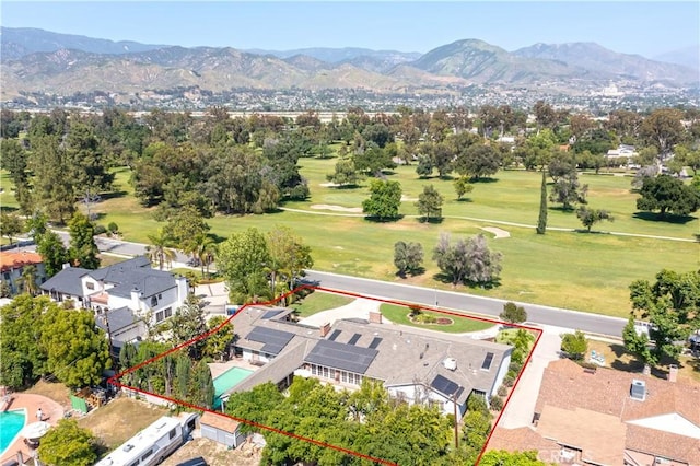 3152 Parkside Dr, San Bernardino, CA 92404 - aerial view of property's location featuring property boundaries highlighted, a mountainous background, and a golf course