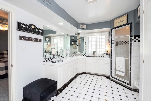 3152 Parkside Dr, San Bernardino, CA 92404 - full bath with toilet, a stall shower, vanity, and recessed lighting
